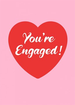 Congratulations to the happy couple with this cute, romantic, red heart with "you're engaged" message.
