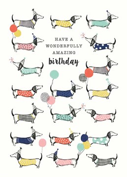 What's better than a dachshund? 19 of them having a party! Send some puppy love with this Art File birthday card.
