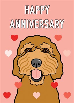 An adorable Cockapoo dog portrait illustration with love hearts features on this Wedding Anniversary card.