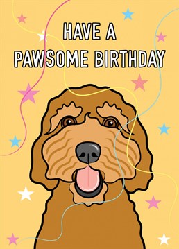 An adorable Cockapoo dog features on this 'pawsome' birthday greeting card design.
