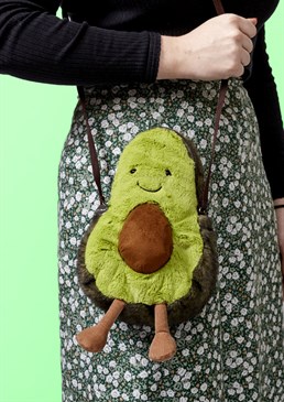Avo cuddle on the go!. Secure zipped compartment. Long cross-body strap. Recommended for age 3+. Sponge clean only. Dimensions: 29cm high, 15cm wide. Nothing says &ldquo;stereotypical millennial&rdquo; like turning up to brunch and eating smashed avo on toast with an avocado accessory draped artfully over your shoulder! Sounds like the dream? Avocado fans know that they aren't just a delicious food, they're a way of life. If you know someone who'd happily eat it every day of the year (that'll be a Sunday roast with a side of avocado please), this adorable yet practical bag will surely be everything they avo wanted! The perfect unique, plush companion with a two-tone outer, with his smiling face and little corded legs, this unbelievably fluffy Amuseable Avo from Jellycat will be more than happy to perch on any surface and keep your belongings safe. However, please be aware that this item is not a toy. This avocado has an important job to do and wishes to be taken seriously!