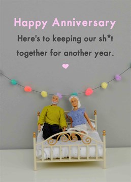 Isn't that what marriage is all about? Wish your better half a very happy anniversary with this silly card by Jeffrey & Janice.