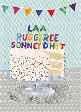 Designed by crumpetsandcrabsticks, this illustrative cake design has 'Laa ruggyree sonney dhyt' (said like 'lair RUGG-er-ee SONN-uh dut') spelled out in candles, this means 'Happy birthday to you' in Manx Gaelic.    Also available in English.