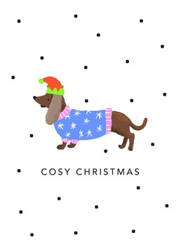 Merry Christmas! Send some festive cheer this year with the 'Cosy Christmas' Sausage Dog card. Illustrated by Emma O'Malley.