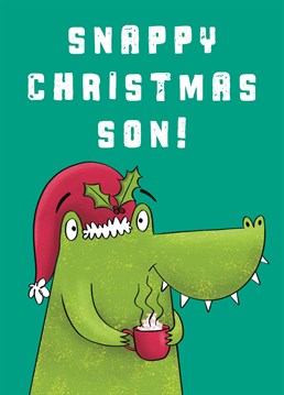 Wish your Son a very Snappy Christmas with this fun crocodile card. It features a crocodile wearing a Santa hat and holding a cup of hot chocolate.