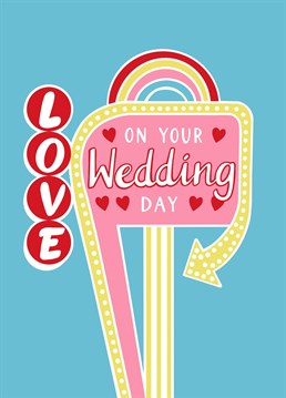 Give the happy couple this retro typography 'love on your wedding day' card on their special day. This cute Las Vegas and rainbow illustration by Jessie Maeve Studio is perfect for a fun loving pair.
