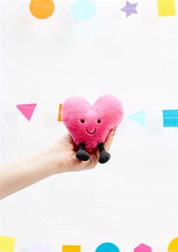 This little pink heart is ready to play the unconventional cupid! Soft and squishy in lush pink fur, with the characteristic brown cordy legs and happy smiley face. This pocket-sized pal is a perfect gift for the one you love!