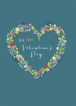 Wish someone a happy Valentine's day with this gorgeous card! Set on a muted teal soft background with bold multicoloured lettering, gorgeous calligraphy and a delicate heart shaped wreath.