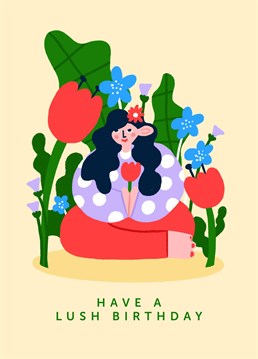 This plant-themed birthday card is perfect for nature lovers. Featuring a minimal stylised illustration of a girl dat amongst leaves and lush flowers and the text 'Have a lush birthday'.