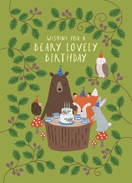 A sweet, illustrated children's birthday card featuring woodland animals gathered to enjoy tea and cake and the caption "Wishing You a Beary Lovely Birthday". This fun kid's birthday card is perfect for the animal loving child of all ages, featuring a bear, hedgehog, rabbit, fox and owl all wearing bright party hats. The gender-neutral fresh design is something a bit different!