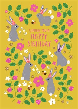 A sweet, illustrated birthday card for kids featuring a lots of bunnies in a strawberry field with the caption "Wishing you a Hoppy Birthday". Make a memorable impact with this all ages childrens birthday card, which brings fun fantasy elements full of wonder. This children's birthday card is part of the Storybook collection from Natalie Alex Designs.