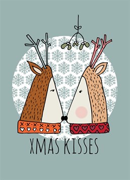Hang the mistletoe and get ready to give your loved one a special eskimo kiss with this cute Christmas card by Nichola Cowdery.