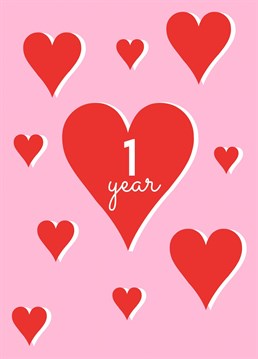 A super cute, romantic, red heart pattern on a pink background especially for celebrating a first anniversary.