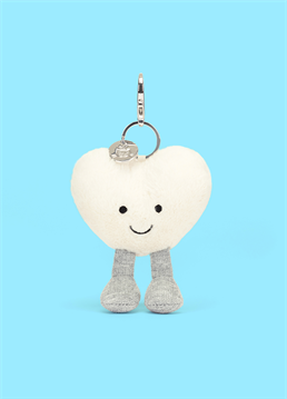 <p>Carry a little love with you with this Jellycat Amuseable Cream Heart Bag Charm. A soft cream heart with glitter jersey legs, and a metallic clasp to secure this smiling heart on your bag.</p>
