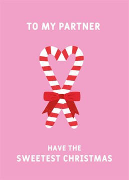 Send sweet, peppermint kisses to your partner with this romantic, candy cane Christmas card by Scribbler.