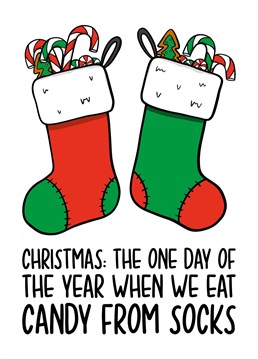 This stockings Christmas card features an illustration of 2 stockings stuffed with candy and the phrase "Christmas: The one day of the year when we eat candy from socks"