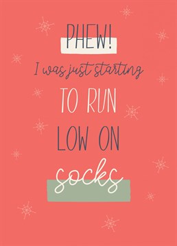 Celebrate the sock loving season with this funny Christmas card from Thinkling Creative.