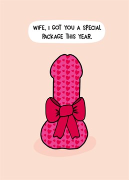 Aw look, it's so pretty and pink! I wonder what it could be? Give your wife a special present tied with a bow this Valentine's. Designed by Scribbler.