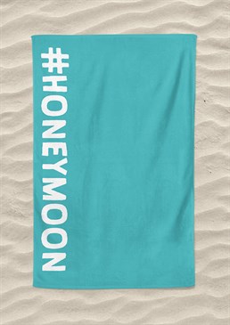 The perfect beach towel for a couple of newly weds who want to shout their love from the rooftops. Get a matching pair or cuddle up together on one if you can't yet bear to be separated! As well as the fact that it might be able to score you some freebies - worth a try right? Machine washable. 147cm x 100cm - extra-large size! Made from 300gsm microfibre towelling. Please note this product is made to order and is non-returnable.<p>Cards and gifts are sent separately. View our Delivery page for more details on Gift processing and delivery times.</p>